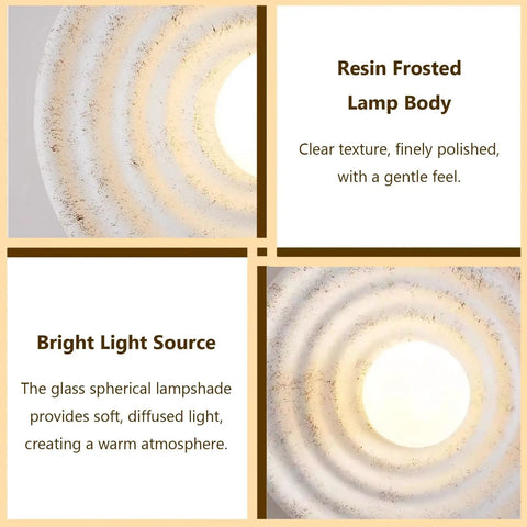 MECOLA Round Resin Accent Wall Sconce Small Glass Globe Shade Wall Lamp showcasing frosted resin body and bright light source.