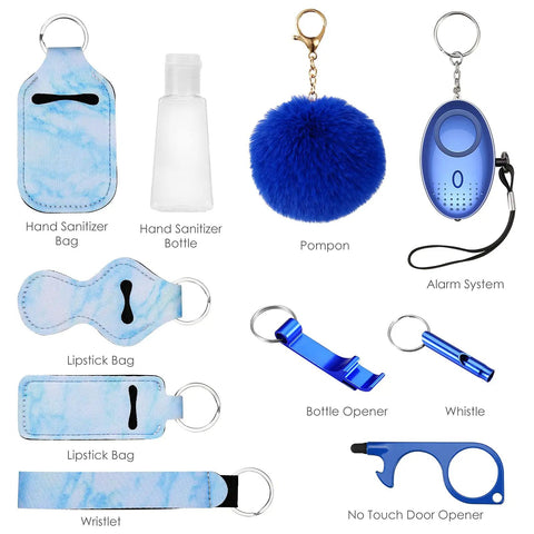 Everyday Safety Keychain Set For Women And Kids With No Touch Door Opener Personal Alarm Whistle Pom Pom And 10 Self Defense Accessories For Girls With Loud Safe Sound Alerts Up To 500 Feet showing sanitizer holder, pom, personal alarm, whistle, and opener.