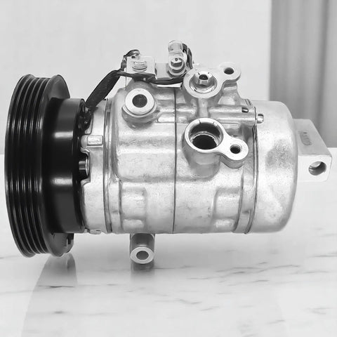 Automotive AC compressor showing metal fittings and pulley, related to Three Piece R134a Adapter Fittings Set With Hose.