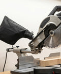 Workhorse Two Pack Miter Saw Dust Collection Bag With Roll Down Zipper Seal And Bendable Steel Wire Opening on a miter saw.