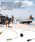 Pro-Grade Boat Bleed And Filler Kit For Hydraulic Steering Systems, Seastar Compatible, displayed on beach with boat in water