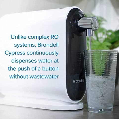 H630 Cypress Countertop Water Filter System With On Demand Three Stage Filtration And Faucet Dispenser dispensing into glass