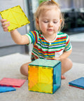 Child playing with 12 Piece Large Magnetic Tiles Set For Kids Jumbo 5.9 Inch Magnetic Base Plates STEM Building Blocks.