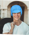Smiling man wearing a blue anti static work cap, lightweight breathable polyester mesh headwear for daily use.