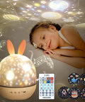 Kids Night Light Rotating Starry Night Projector With Remote Control 6 Projection Films USB Rechargeable Soothing Music Bedside Nursery Lamp for Baby Boys Girls Gift White, child enjoying projections