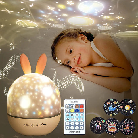 Kids Night Light Rotating Starry Night Projector With Remote Control 6 Projection Films USB Rechargeable Soothing Music Bedside Nursery Lamp for Baby Boys Girls Gift White, child enjoying projections