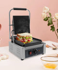 1800W Commercial Panini Press Grill Stainless Steel Electric Sandwich Maker with adjustable temp, grilling sandwich with veggies.