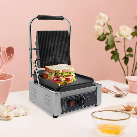 1800W Commercial Panini Press Grill Stainless Steel Electric Sandwich Maker with adjustable temp, grilling sandwich with veggies.
