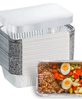 Stack of Disposable Aluminum Pans With Lids 50 Pack, 8.5 By 6 Inch Top, 6.5 By 4.5 Inch Bottom, featuring meal inside