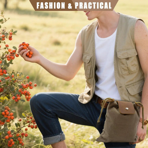 Person gathering berries with Waxed Canvas Foraging Belt Pouch With Leather Trim Collapsible Outdoor Pouch attached to belt.