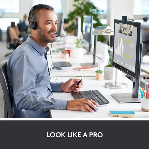 Man using Straight Fire Top Tier HD Webcam Featuring Quick Release Privacy Shutters 1080P Full HD Auto Focus for video call.