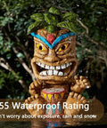 Solar Powered Tiki Statue Light For Garden, Patio, And Backyard Decor, waterproof totem pole figurine in outdoor setting