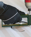 Person using Adjustable Circle Hole Cutter for Sheet Metal 2 to 12 Inch with 2 Drill Bits for cutting round hole in metal sheet.