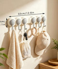 No Drill Drama Heavy Duty Wall Hook Rack With Grip Tape That Saves Your Paint While Serving A Flexible Swivel Fold, holding towels and keys.