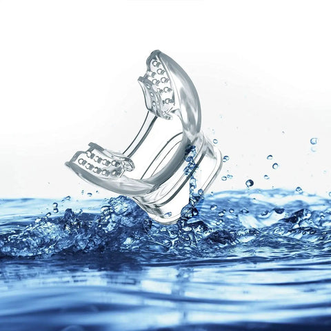 Transparent Silicone Regulator Mouthpiece Set Of 6 For Scuba Diving shown above water splash, illustrating soft bite design.