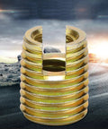 Self Tapping Thread Inserts Kit In Carbon Steel For Thread Repair With Inner M3x0.5 And Outer M5x0.5 Threads Plus Inner M12x1.75 And Outer M16x1.5 22mm Length Built To Last Heavy Duty Vibration Resistant Fastener Repair For Home Auto Industrial, gold insert close-up