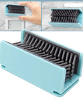 Reusable Silicone Hair Catcher Drain Protector, Bathroom Hair Trap for Shower and Bathtub, wall-mounted hair collector in teal color.