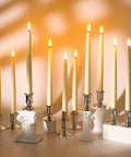 Elegant display of Dope Cone Shaped Flameless Window Candles 12 Pack LED Battery Powered Timed Warm Light With 3D Wick, Plastic Base