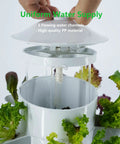 Hands adjusting the lid of a Vertical Indoor Hydroponic Tower Garden System With 30 Pods, showing auto water circulation feature