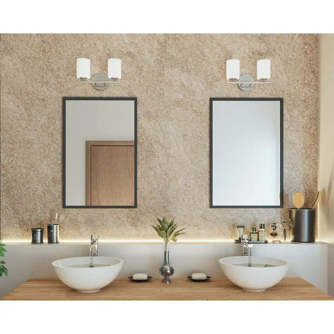 Two Light Vanity Light With Etched White Glass Modern Bath Fixture In Polished Nickel Finish mounted above dual sinks