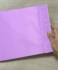Close-up of a purple 100 Pack Polyethylene Mail Bags With Waterproof Seal For Dope Durable Poly Mailers Great For Local And Long Distance Shipping
