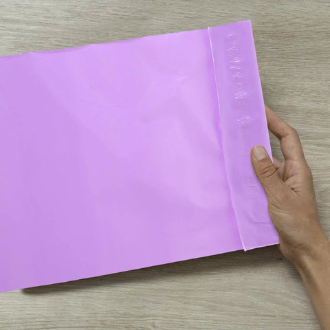 Close-up of a purple 100 Pack Polyethylene Mail Bags With Waterproof Seal For Dope Durable Poly Mailers Great For Local And Long Distance Shipping