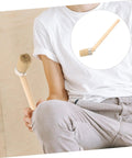 Person holding a Wood Handle Pig Bristle Paint Brush For Acrylics Stain And Wall Painting Awesome For DIY Furniture And House Projects.