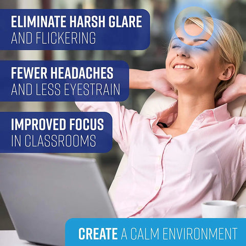 Woman relaxed at desk with Magnetic Fluorescent Light Covers For Ceiling Lights 5 Pack Sky Blue Cloud Filters Easy Install Reduces Glare Headaches And Eyestrain In Classrooms And Offices.