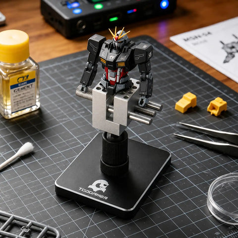 Mini Tabletop Vise That Converts to Handheld, 360 Degree Rotatable Precision Bench Clamp holding model on desk