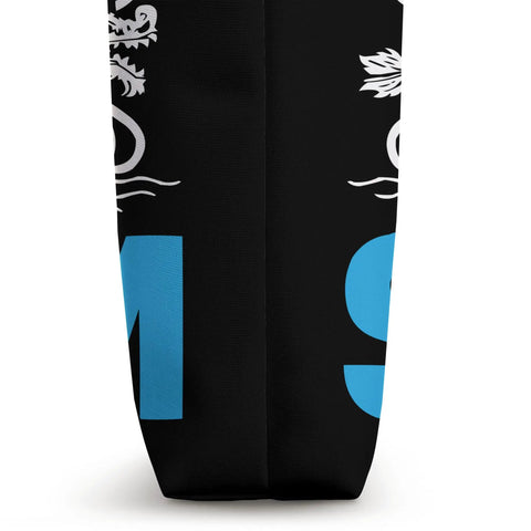Side view of Dragon Boat Paddler Tote Bag For Dragonboating Enthusiasts with dragon design on black fabric