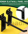 Close-up of black 2-inch hooks from 32 Piece Slatwall Hook Set With 2 Inch 4 Inch 6 Inch And 8 Inch Heavy Duty Display Hooks For Garage Shop And Retail Pegboard Gridwall Organization Assorted Mounting Brackets.