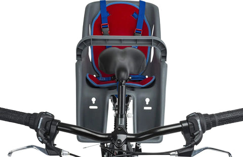 Rear Mount Lil Rider Child Bike Seat With Five Point Harness And Spoke Guard, view from bike handlebars.