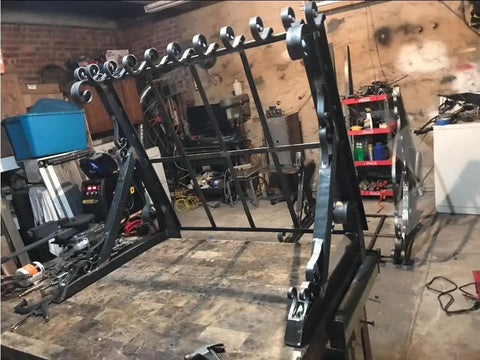Workshop view of Manual Heavy Duty Rod And Flat Bar Bender 3 In 1 Scroll Bender for precise bends on steel.