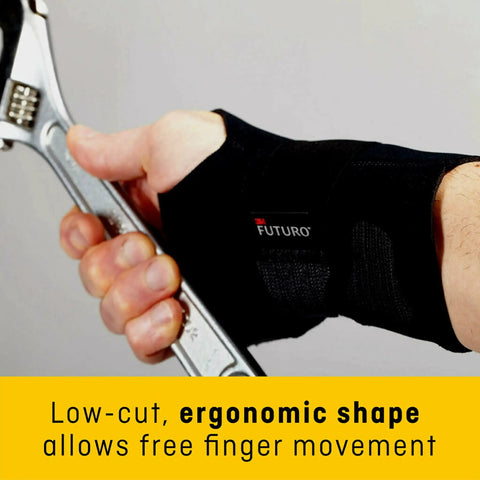 Left Hand Compression Wrist Brace With Three Adjustable Straps For A Custom Fit And Moderate Support Lets Your Fingers Move Naturally Easy To Use Black Size L/XL holding a wrench