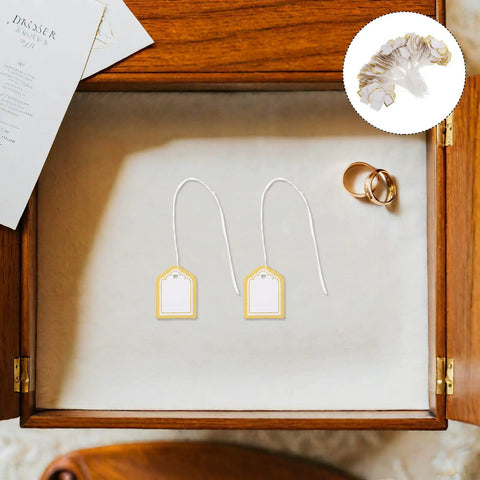 Fan Shaped Golden No Frills Price Tags With String 500 Pack Blank Writable Surface For Clothes Gifts Jewelry Crafts And Vendor Booth Displays Perfect For Marking Items At Sales. white and gold price tags in a wooden box