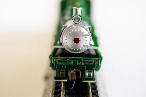 Front view of Prairie 2 6 2 Locomotive and Tender N Scale Green Train Set for Model Railroading