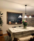 Industrial Glass Island Pendant Light In Oil Rubbed Bronze over dining table, modern fixture, clear glass shade, chic home decor