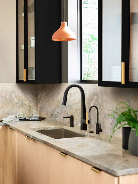 Matte Black Modern Deck Mounted Kitchen Soap Dispenser With An 18 Ounce Refillable Bottle Above The Sink Ideal For Soap Or Lotion No Fuss Refills And A Sleek Look That Coordinates With Any Kitchen Faucet in a stylish kitchen setting.