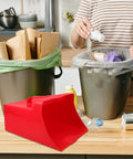 Handheld Dustpan and Scoop Shovel Grab and Go Cleanup in red on kitchen counter next to trash bins, wide 9.65x8.07 inch scoop