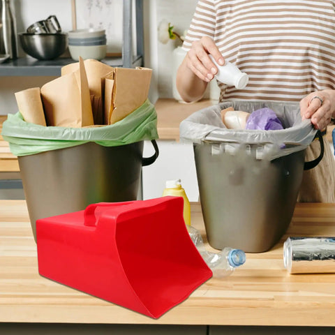 Handheld Dustpan and Scoop Shovel Grab and Go Cleanup in red on kitchen counter next to trash bins, wide 9.65x8.07 inch scoop