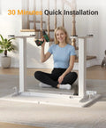 Person assembling Electric Standing Desk With Three Memory Presets, 40 By 24 Inch Sit To Stand Desk, Ergonomic White Top