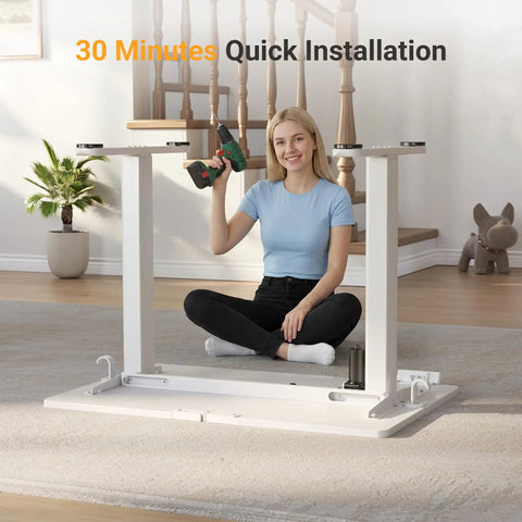 Person assembling Electric Standing Desk With Three Memory Presets, 40 By 24 Inch Sit To Stand Desk, Ergonomic White Top