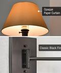 Close-up of 15 Inch Dope Modern Swing Arm Wall Sconce with Opaque Empire Shade and Black Finish, detail of paper curtain and fixture