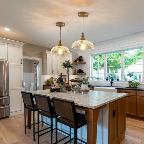 Slick Oil Rubbed Bronze One Light Pendant Ceiling Lamp With Retro Dome Glass Shade over kitchen island with plants and decor.