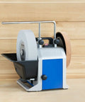 Top Shelf Water Cooled Sharpening System For Keeping All Your Edges Slick And Fly On Every Woodworking Project Featuring Smooth Wet Cooling And Includes Full Guide For That Pro Hustle Setup with white sharpening wheel.