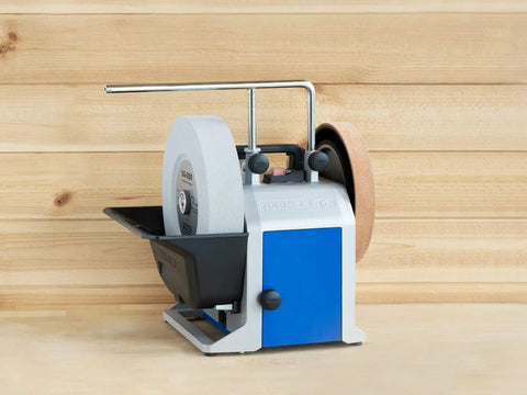 Top Shelf Water Cooled Sharpening System For Keeping All Your Edges Slick And Fly On Every Woodworking Project Featuring Smooth Wet Cooling And Includes Full Guide For That Pro Hustle Setup with white sharpening wheel.