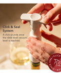 Hands using Original Saver Wine Bottle Stopper Set With Pump and 2 Vacuum Stoppers Keeps Red and White Wine Fresh Up To 10 Days