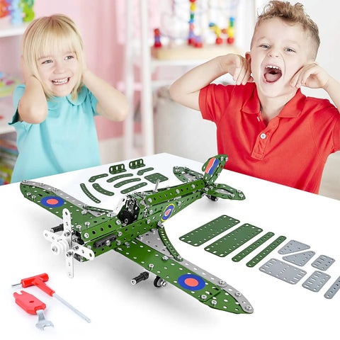 Kids assembling Build Your Own Hurricane Fighter Plane Kit With 331 Metal Parts In 1:32 Scale on a table