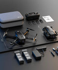 Dope 4K Camera Drone For Adults With FAA Compliant Remote ID Module shown with controls, batteries, and accessories.