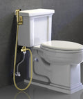 Handheld Bidet Sprayer For Toilet In SUS304 Stainless Steel Brushed Gold Kit with 47 Inch Hose installed on white toilet